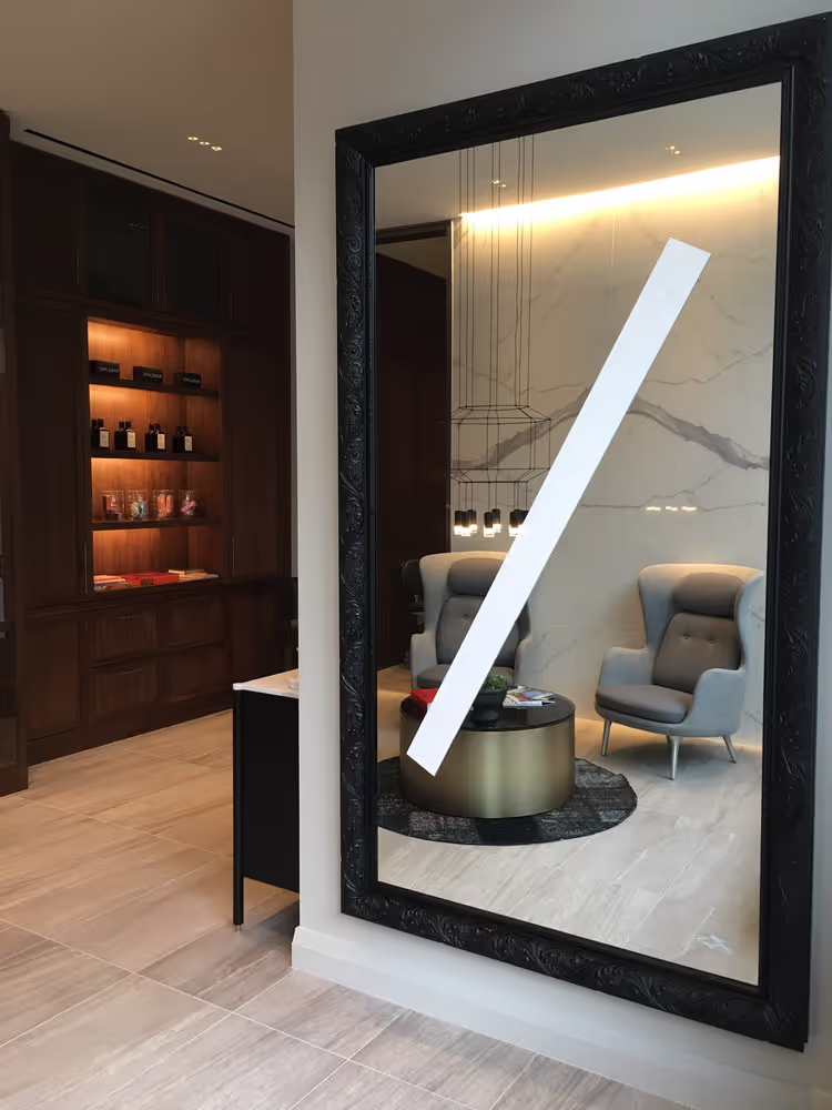 Modern Smilebar clinic interior with seating area, mirror reflection, and retail product display